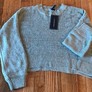 Cropped light knit sweater